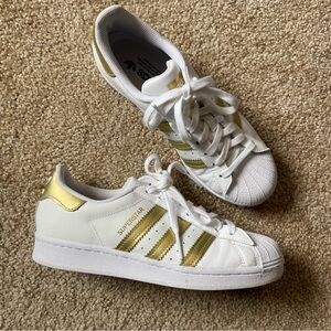 Adidas Superstar sneakers gold and white
